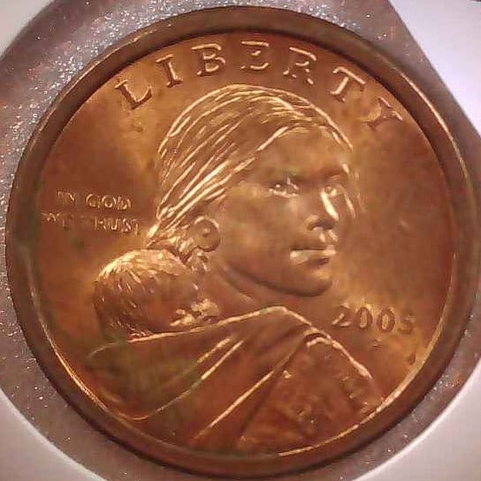 UNITED STATES 2005 P SACAGAWEA DOLLAR: Mint issued the Sacagawea Golden Dollar from 2000 to 2008. It was the first dollar made with an outer layer of manganese brass, giving it a golden color. The obverse design features Sacagawea and the 