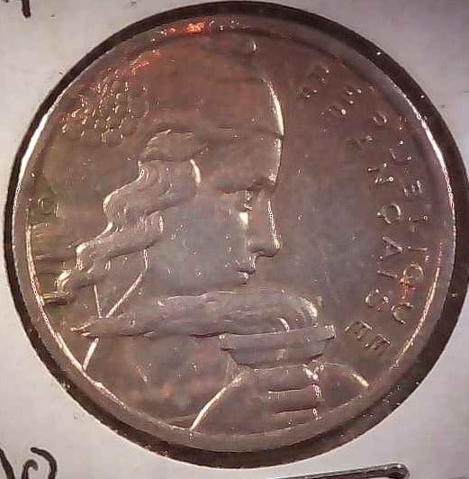 FRANCE 1954 100 FRANCS: The bust of Liberty holding a torch facing right Script: Latin Lettering: REPUBLIQUE FRANÇAISE CR Translation: French Republic Engraver: Robert Cochet Reverse Value and date with mintmark on left. Le
