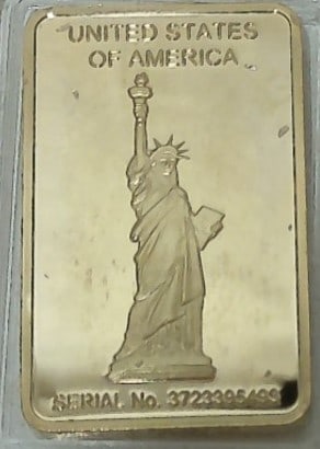UNITED STATES 1 TROY OUNCE 100 MILS .999 FINE GOLD CLAD BAR: 100 mills .999 fine gold clad bar. It is a bar of base metal, usually copper, that has been plated with a layer of gold 100 millionths of an inch thick (1/10,000 of an inch)