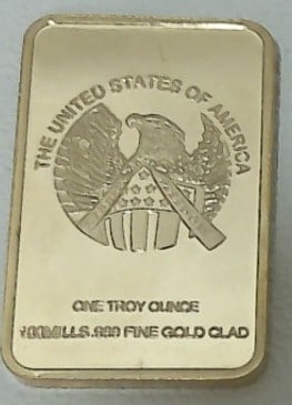 UNITED STATES 1 TROY OUNCE 100 MILS .999 FINE GOLD CLAD BAR: 100 mills .999 fine gold clad bar. It is a bar of base metal, usually copper, that has been plated with a layer of gold 100 millionths of an inch thick (1/10,000 of an inch)