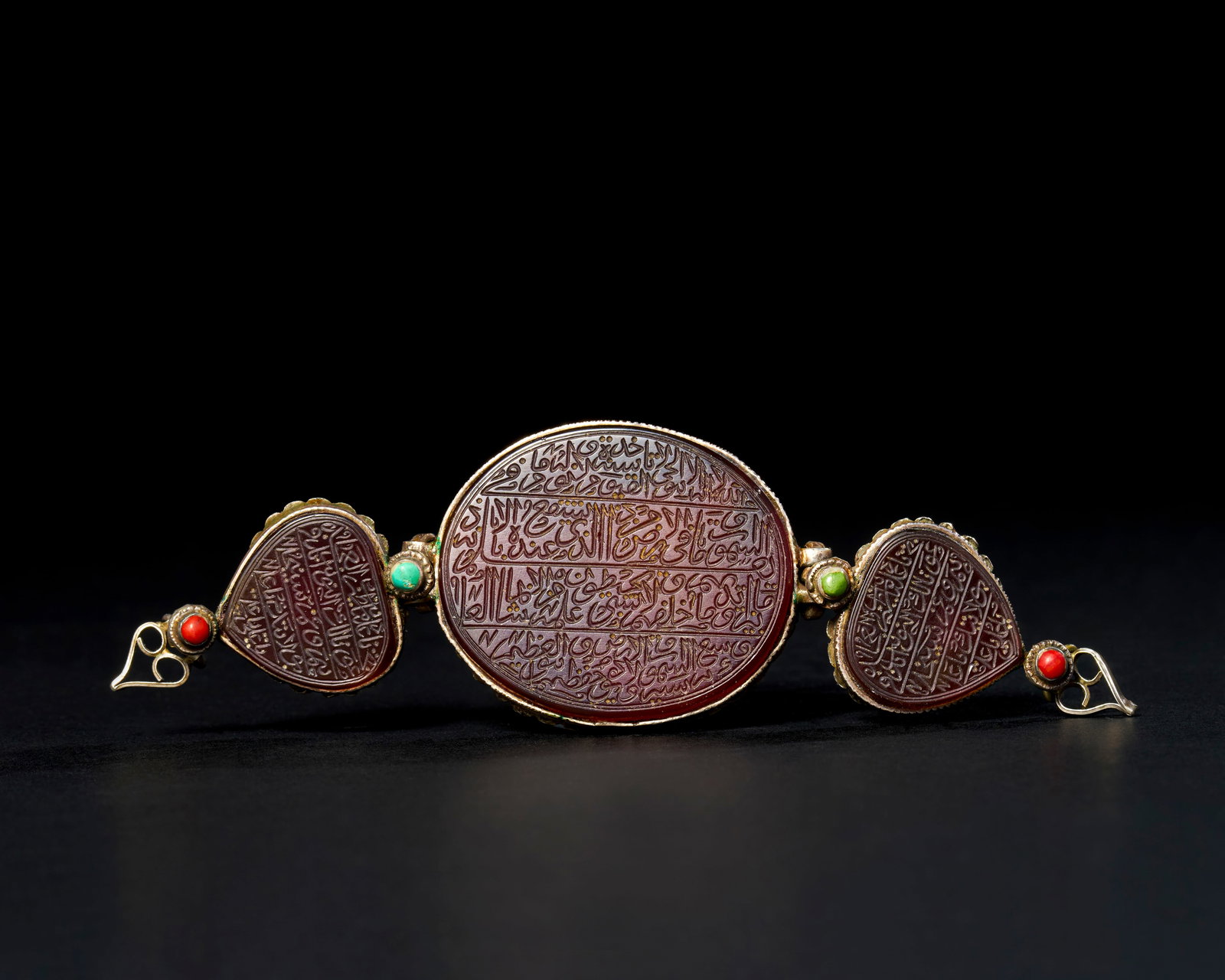 A PERSIAN CARNELIAN AGATE THREE SECTIONAL BAZU-BAND, PERSIA, 19TH CENTURY (1 of 3)