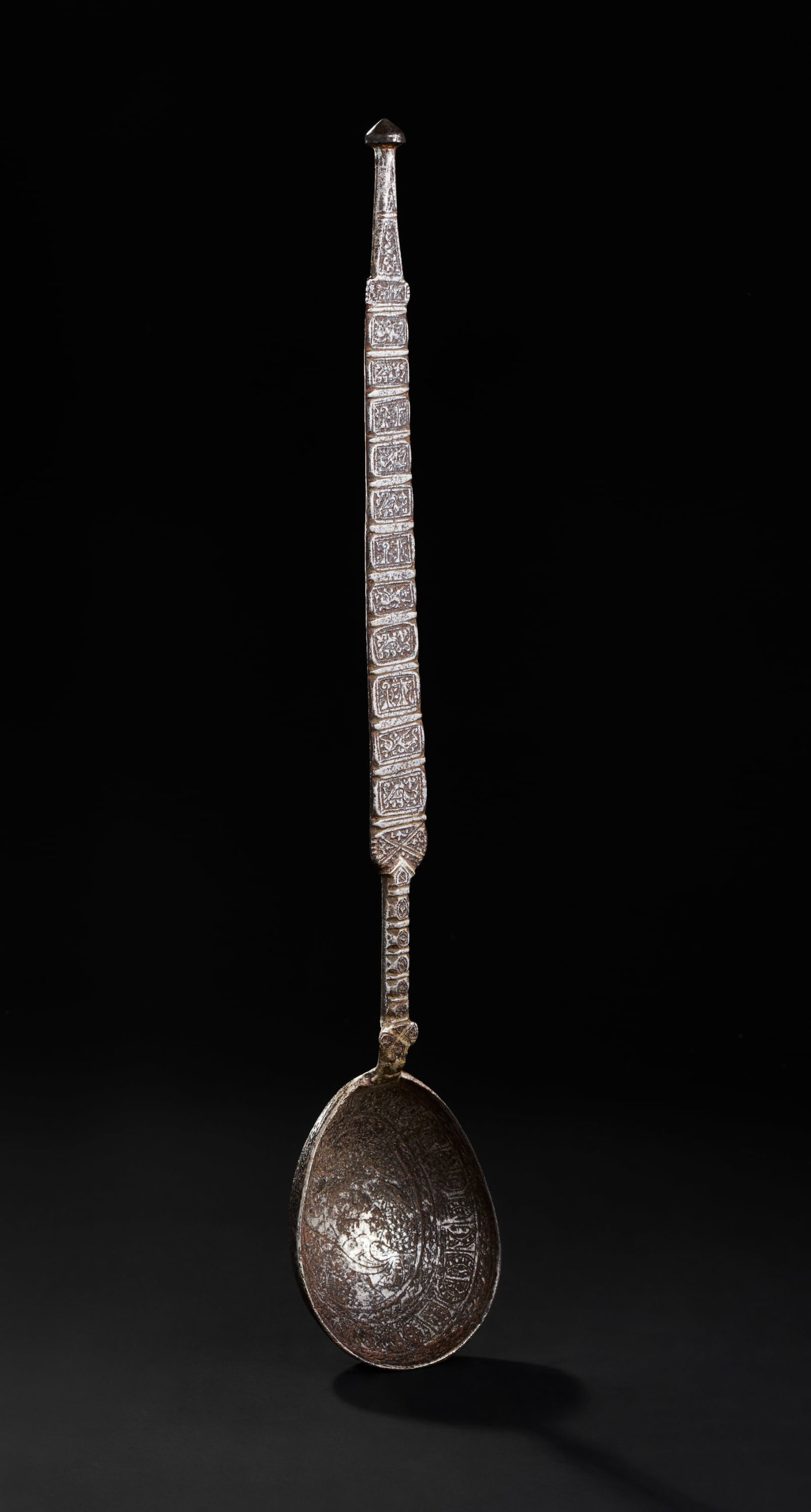 A RARE SELJUK ENGRAVED IRON LIDLE WITH KUFIC CALLIGRAPHY AND MYTHICAL CREATURES, PERSIA, 11TH - 12TH (1 of 4)