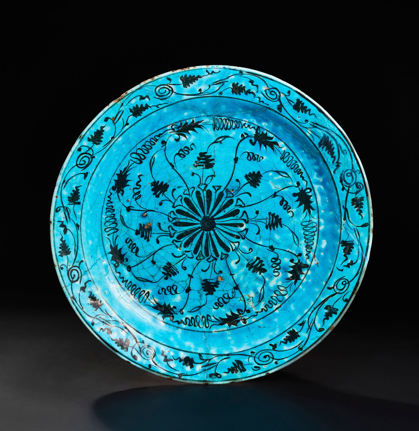 A LARGE KUBACHI TURQUOISE GLAZED POTTERY DISH, PERSIA, 16TH-17TH CENTURY (1 of 2)