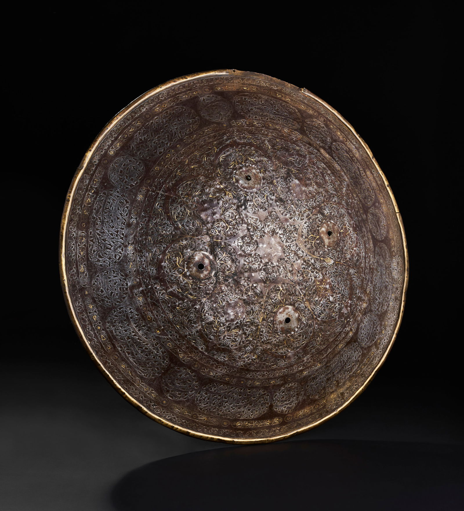 A QAJAR CALLIGRAPHIC STEEL SHIELD, PERSIA, 19TH CENTURY: A QAJAR CALLIGRAPHIC STEEL SHIELD, PERSIA, 19TH CENTURY Diameter: 50.5cm