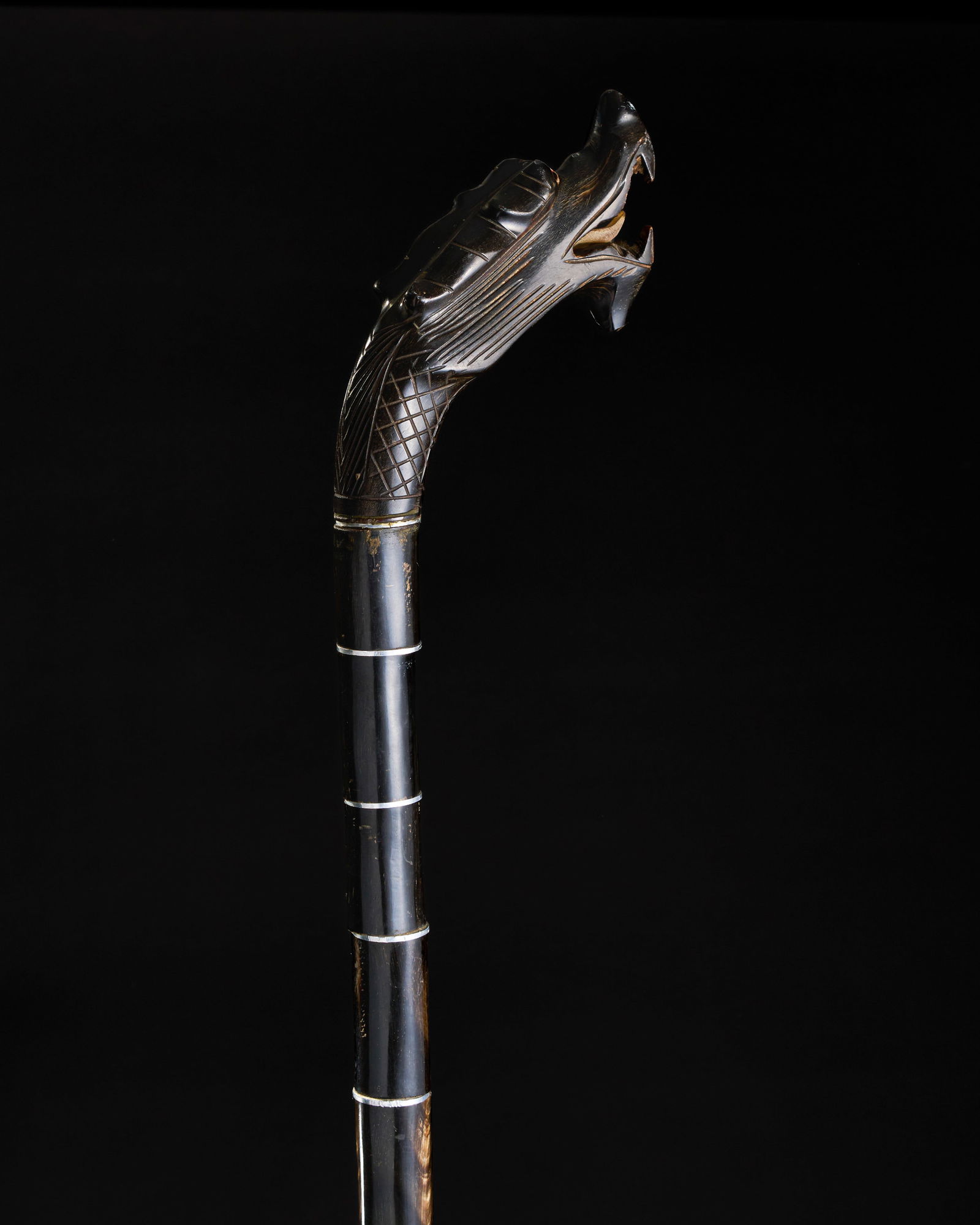 AN EBONY WALKING STICK, PROBABLY INDONESIAN (1 of 2)