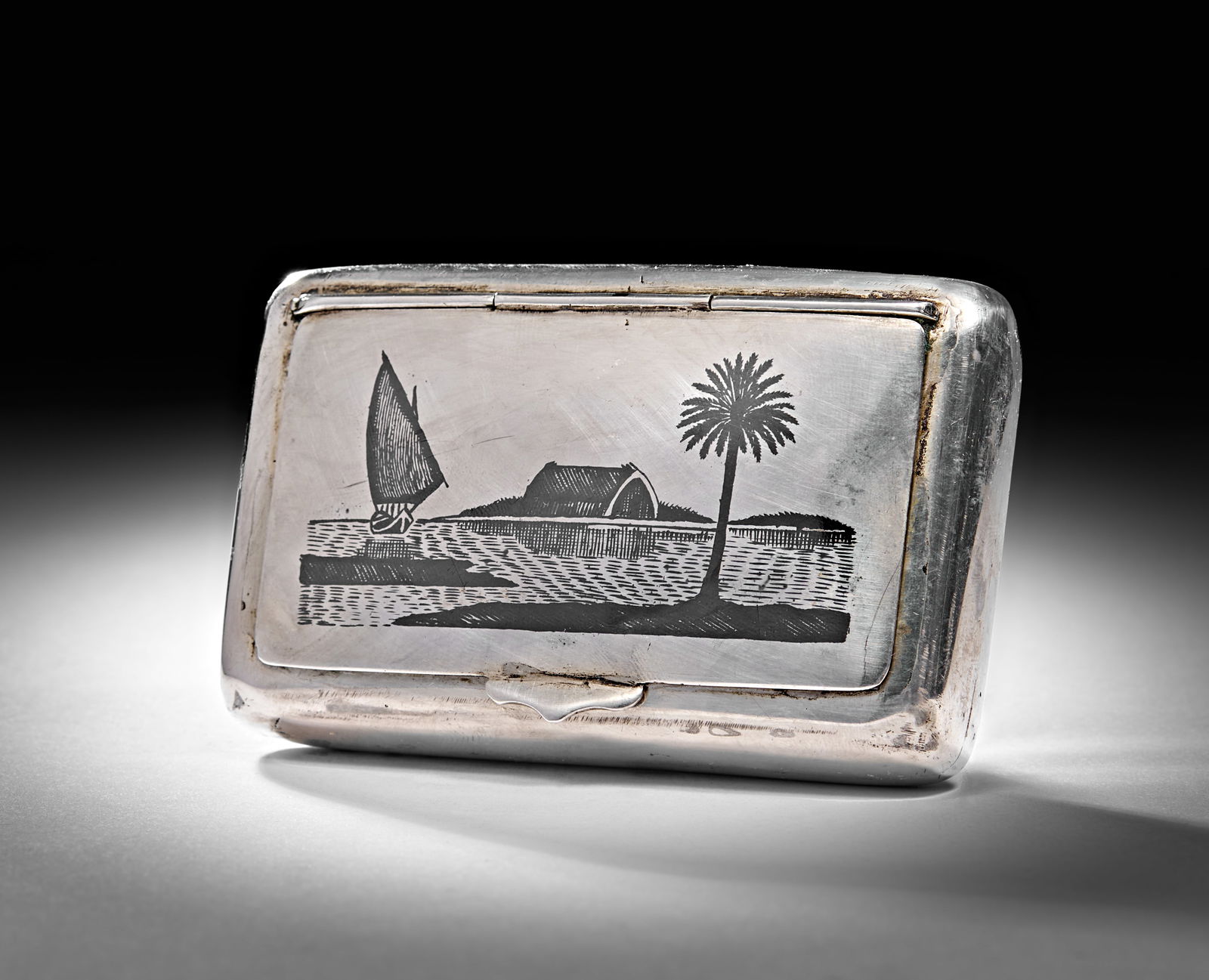 A SILVER AND NIELLO SNUFF BOX, IRAQ, 20TH CENTURY (1 of 3)