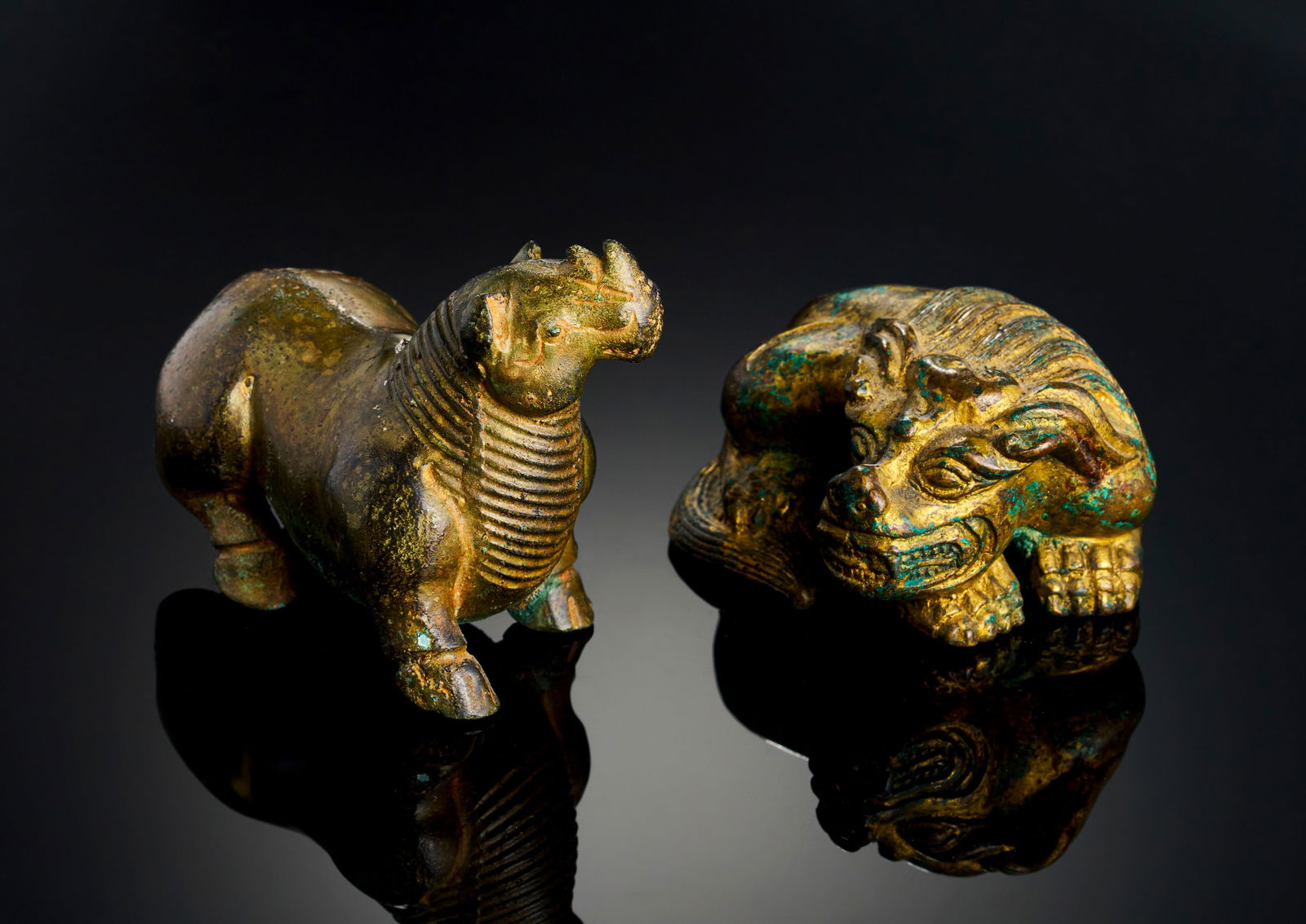 A TWO CHINESE GILT BRONZE FIGURES, POSSIBLY HAN DYNASTY OR LATER (1 of 4)
