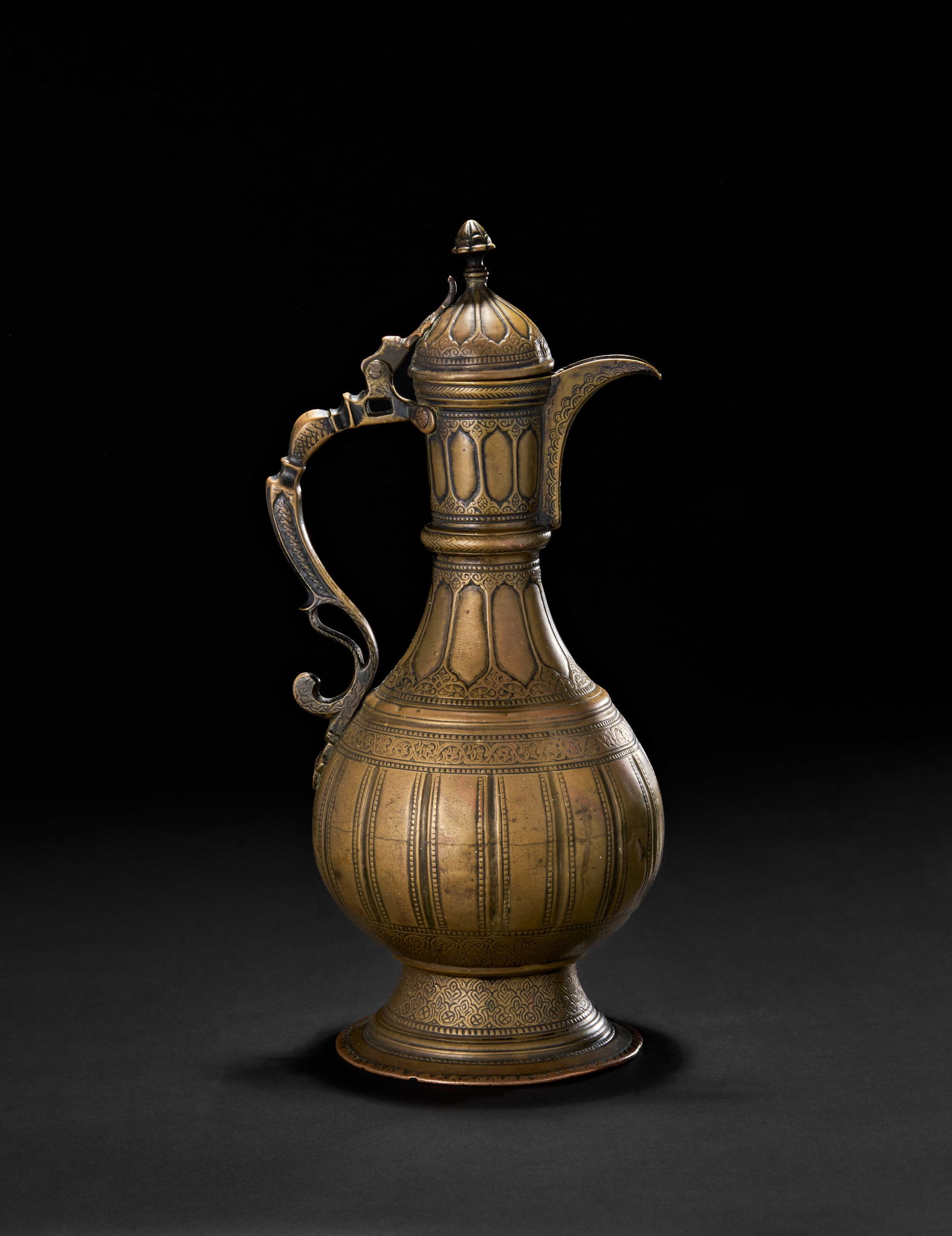 A BRASS ENGRAVED EWER SIGNED BY MASTER AHMED, CENTRAL ASIAN BUKHARA, 19TH CENTURY (1 of 4)