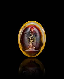 A GRECO PERSIAN PERIOD AGATE INTAGLIO DEPICTS A MUSICAL PLAYING THE LYRE, 200 B.C: A GRECO PERSIAN PERIOD AGATE INTAGLIO DEPICTS A MUSICAL PLAYING THE LYRE, 200 B.C  L: 2.2cm&nbsp;