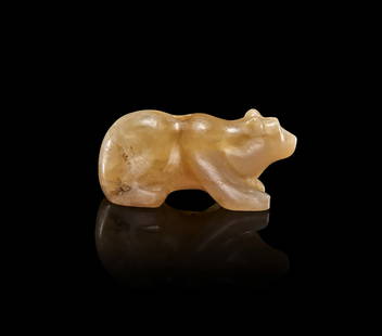 A GREEK CHALCEDONY AGATE OF A STANDING BEAR, HELLENISTIC PERIOD: A GREEK CHALCEDONY AGATE OF A STANDING BEAR, HELLENISTIC PERIOD L: 2.2cm