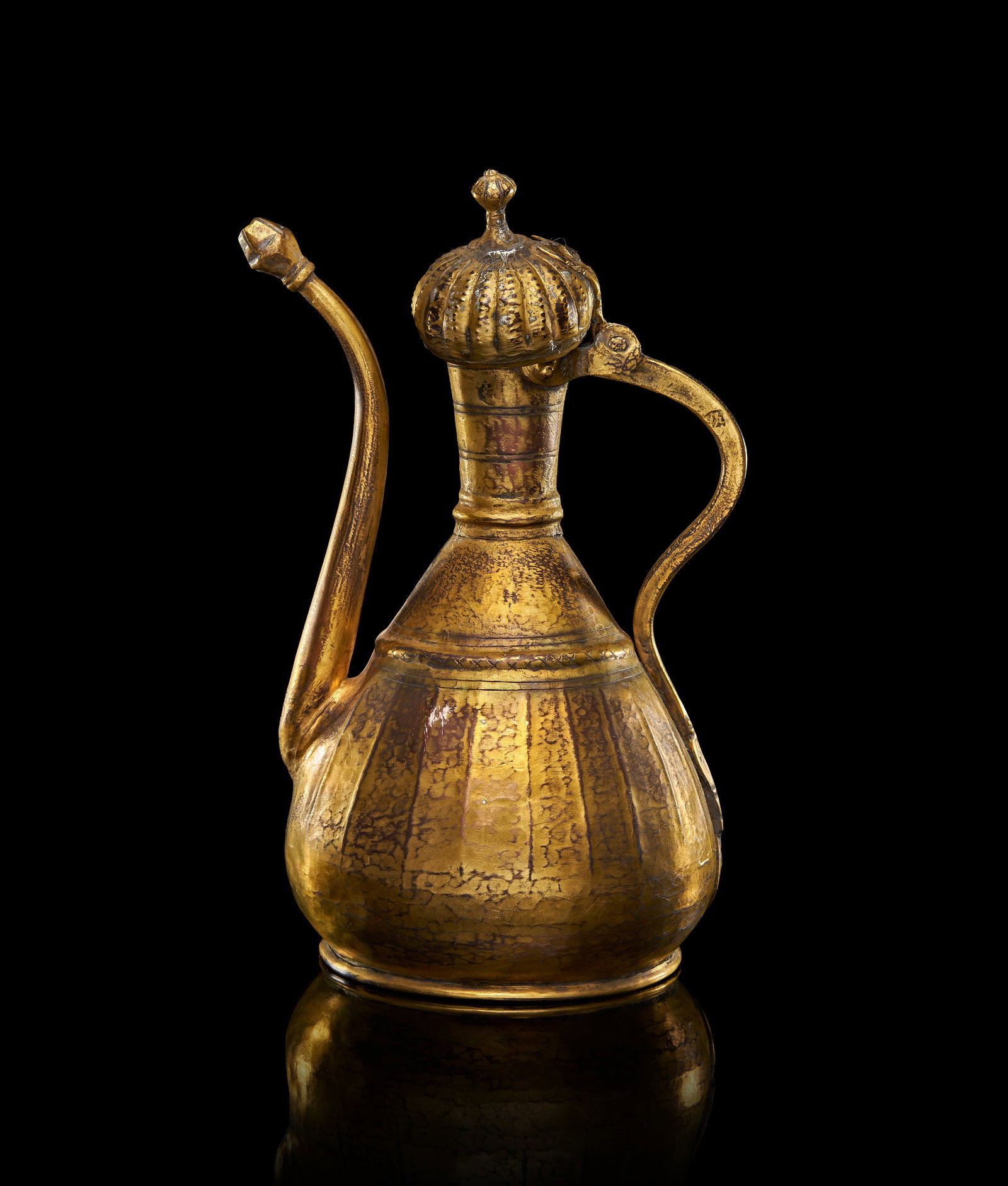 AN OTTOMAN GILT COPPER (TOMBAK) LIDDED EWER, TURKEY, 17TH CENTURY (1 of 5)