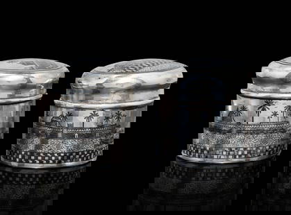 TWO IRAQI SILVER AND NIELLO JARS, 20TH CENTURY: TWO IRAQI SILVER AND NIELLO JARS, 20TH CENTURY H: 5.3cm Weight: 136g