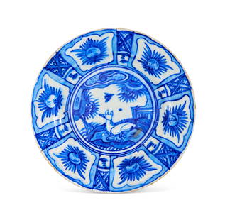 A BLUE AND WHITE CRACK WARE CERAMIC DISH, PERSIA, 18TH - 19TH CENTURY: A BLUE AND WHITE CRACK WARE CERAMIC DISH, PERSIA, 18TH - 19TH CENTURY  Diameter: 23.5cm&nbsp;
