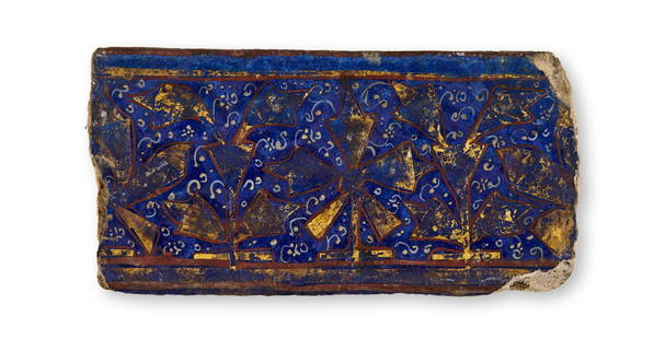 A BLUE LAJVARDINA MOULDED POTTERY TILE, PERSIA, 12TH - 13TH CENTURY: A BLUE LAJVARDINA MOULDED POTTERY TILE, PERSIA, 12TH - 13TH CENTURY 16 x 8cm 