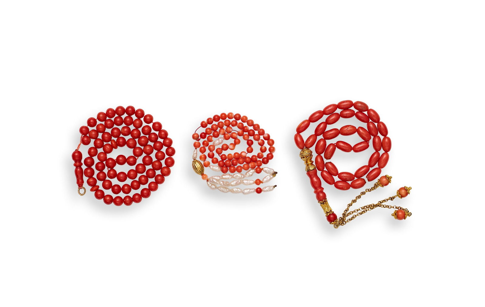 THREE CORAL ROSARY/PRAYER BEADS, 19TH CENTURY: THREE CORAL ROSARY/PRAYER BEADS, 19TH CENTURY Total weight: 49g Longest L: 28cm 