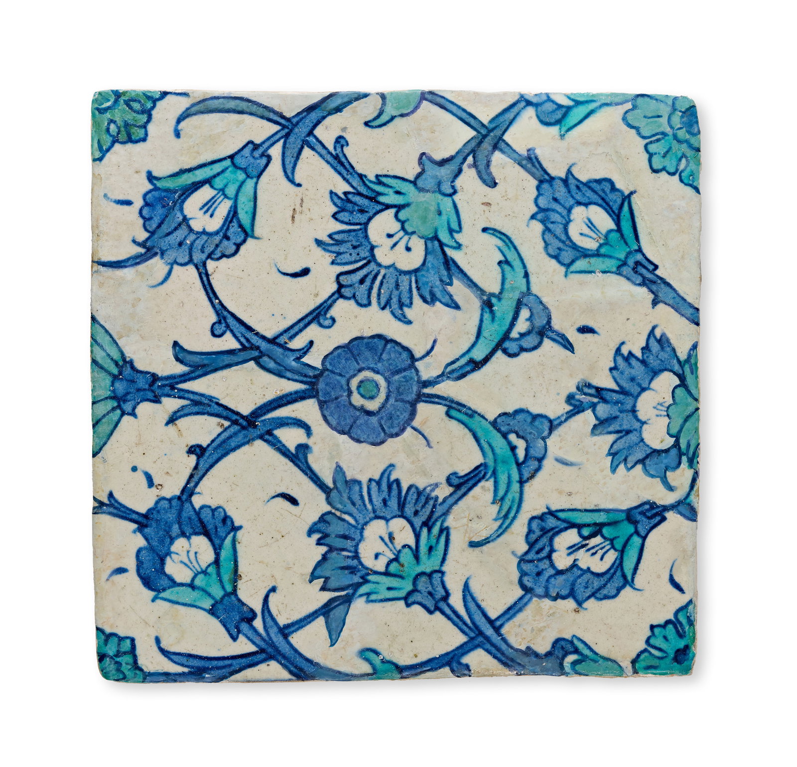 AN IZNIK BLUE AND WHITE POTTERY TILE, OTTOMAN TURKEY, CIRCA 16TH-17TH CENTURY (1 of 1)