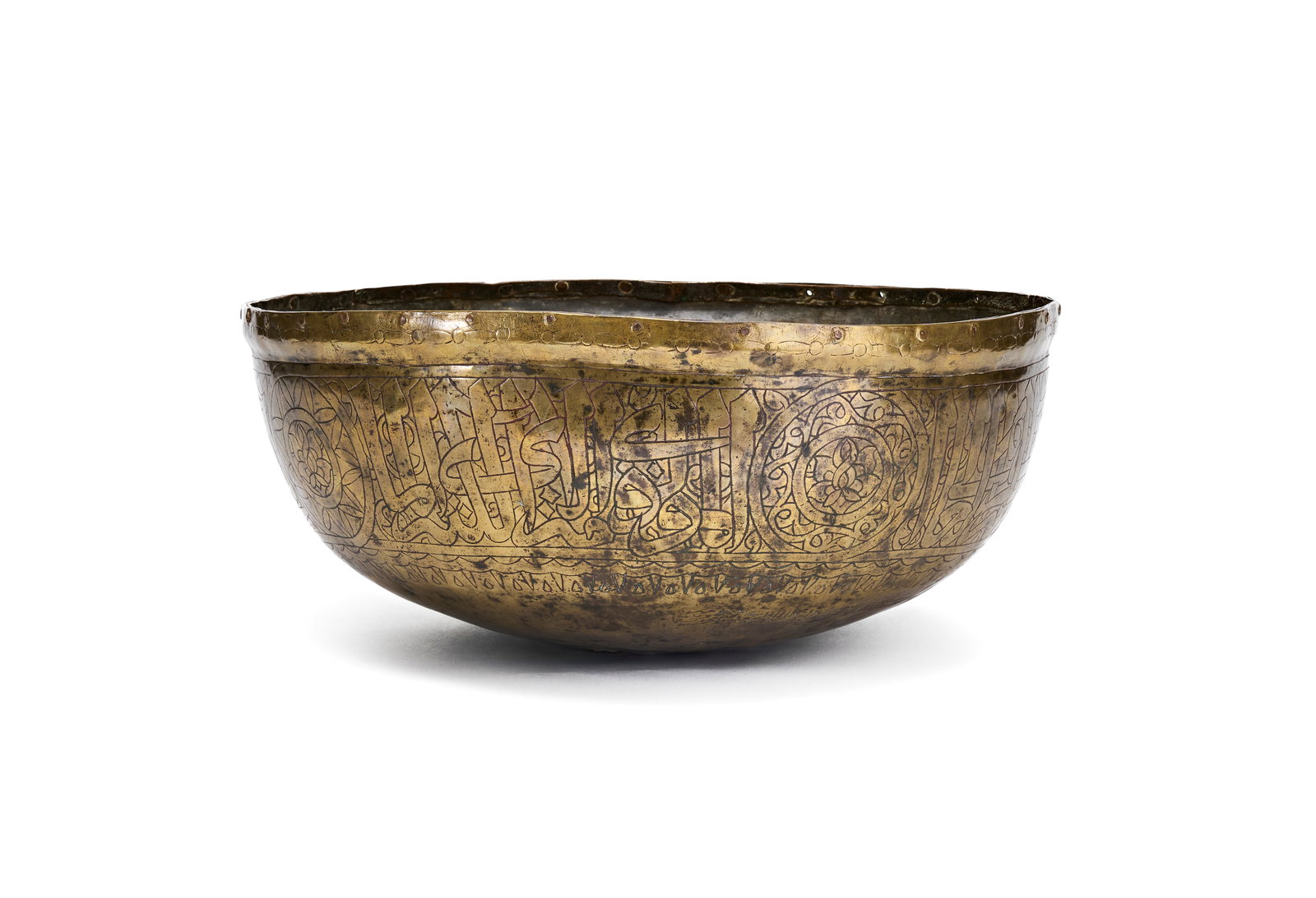 A LARGE MAMLUK ENGRAVED BRASS BOWL / DRUM, EGYPT OR SYRIA, DATED 920 AH - 1514 A.D.: This large brass bowl or drum is characteristic of Mamluk metalwork from Egypt or Syria, Dated 920 AH - 1514 A.D.. The vessel is of hemispherical form with a slightly upright rim, constructed from bra