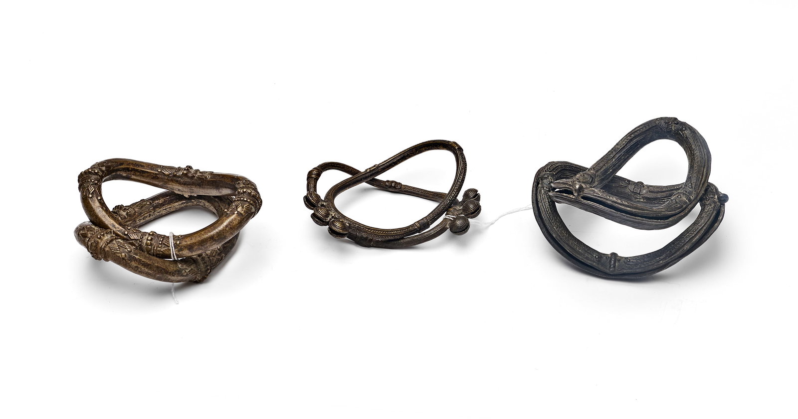 A THREE PAIRS OF INDIAN CAST COPPER ALLOY TRIBAL ANKLETS, SOUTH INDIA DECCAN, 17TH CENTURY (1 of 6)