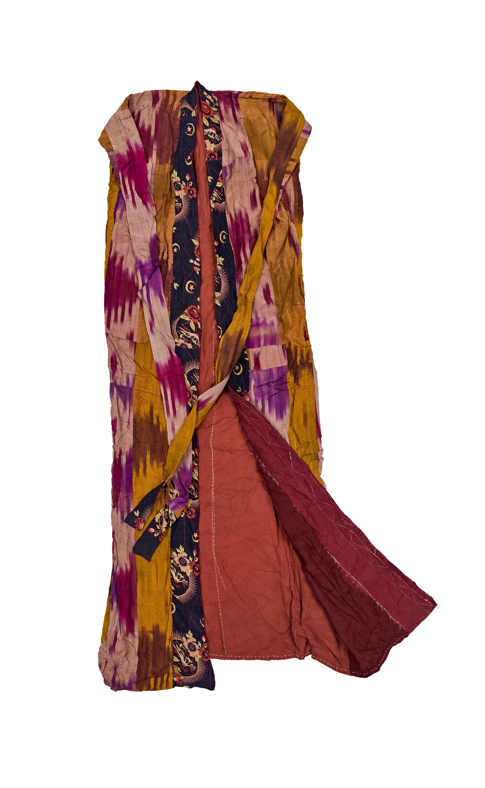 A CENTRAL ASIAN SILK AND COTTON IKAT WOMAN'S CHAPAN, CIRCA 1880S (1 of 3)
