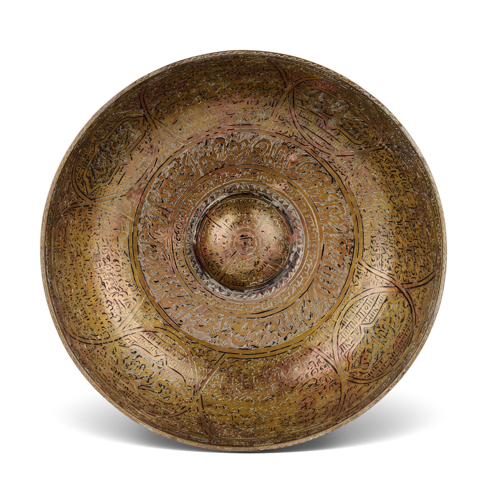 A MUGHAL ENGRAVED BRONZE DIVINATION/MAGIC BOWL, INDIA, 18TH CENTURY: Is densely decorated throughout with engraved and chased calligraphic and figurative motifs intended for talismanic purposes. The exterior body is decorated with a primary register of twelve circular 