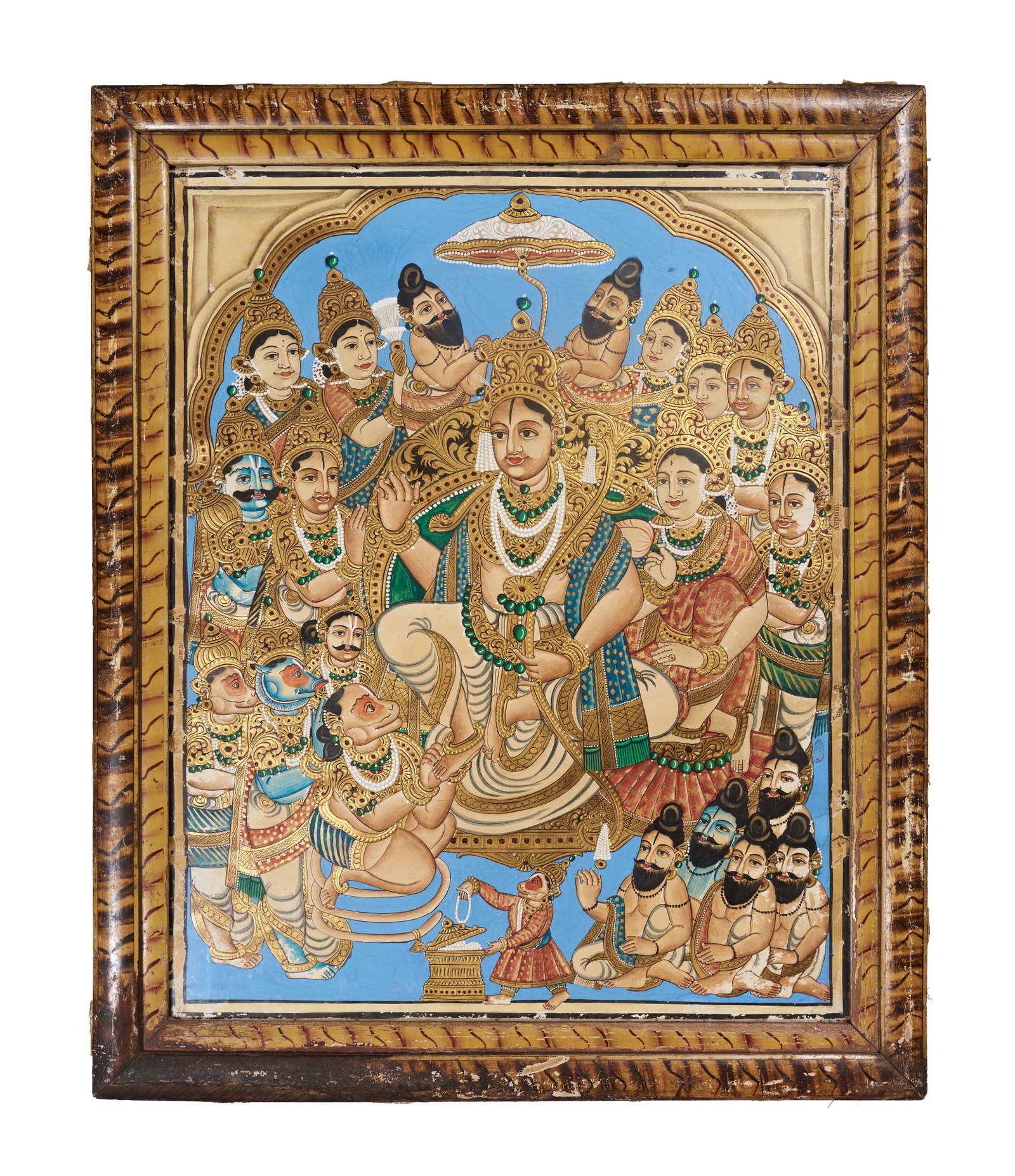 A LARGE RAMA DARBAR TANJORE DEVOTIONAL PAINTING PAPER ON BOARD, SOUTH INDIA, 19TH CENTURY: This South Indian devotional painting, executed in the traditional Tanjore (Thanjavur) style, depicts the Rama Pattabhishekam or the coronation of Lord Rama. The central composition features Lord Rama
