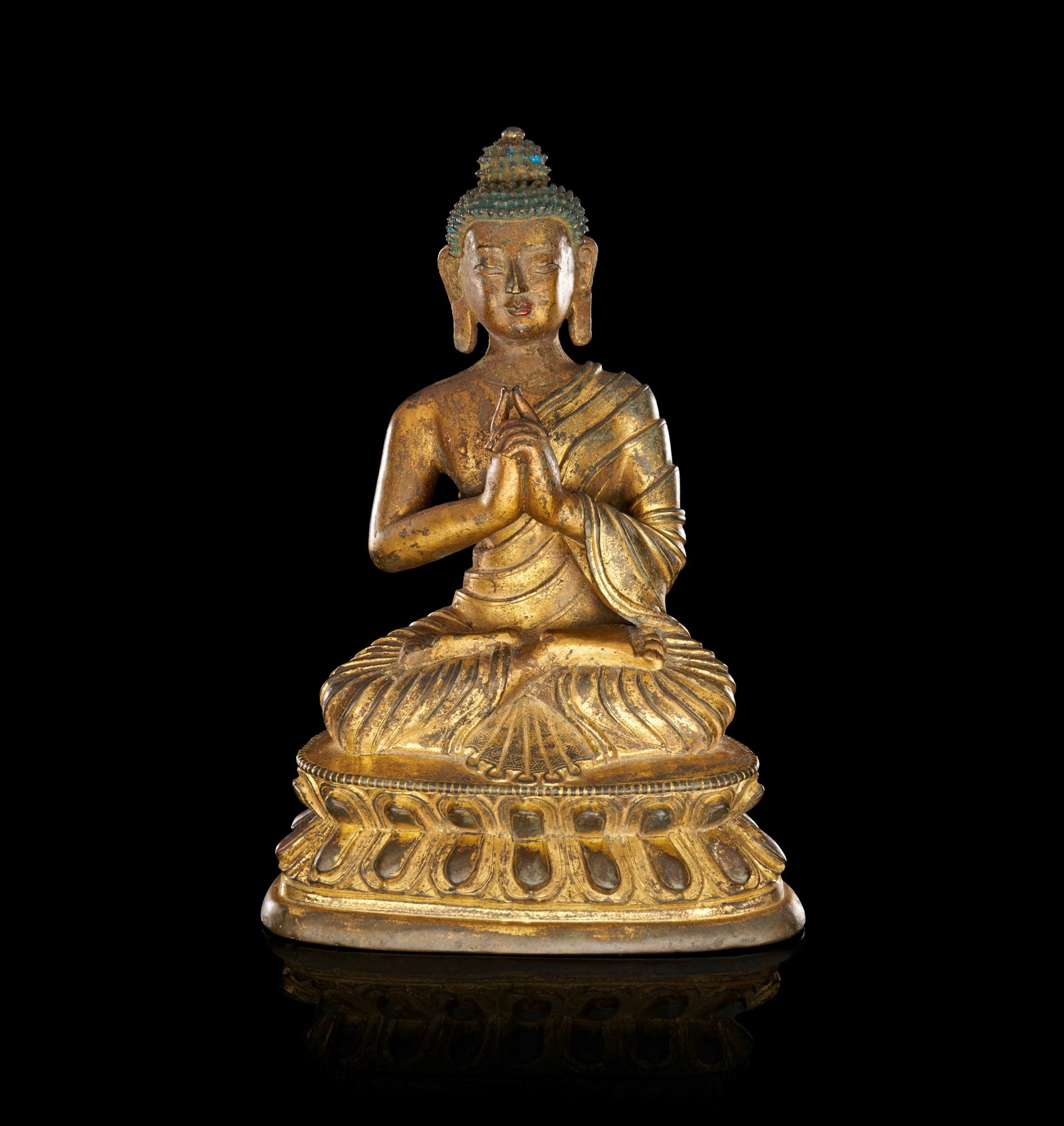 A TIBETO-CHINESE GILT BRONZE FIGURE OF A SEATED BUDDHA, 17TH-18TH CENTURY (1 of 5)