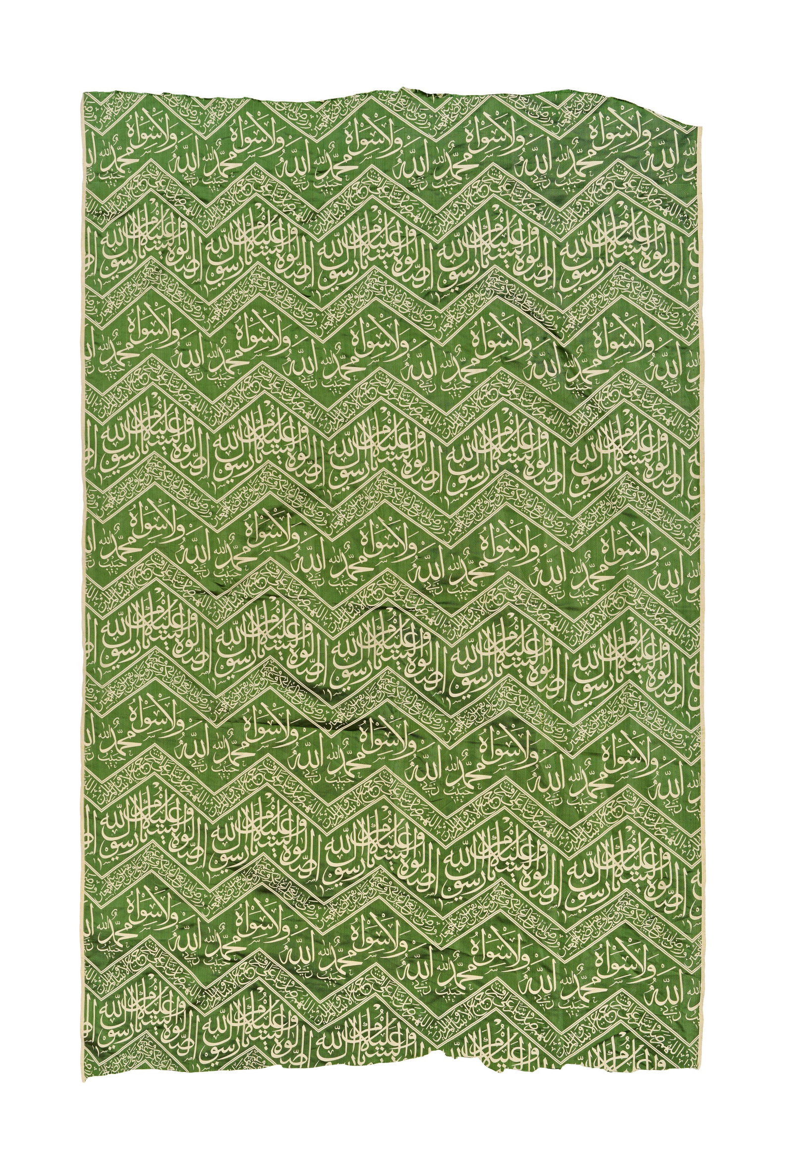 A CALLIGRAPHIC ISLAMIC SILK TEXTILE FRAGMENT, 20TH CENTURY: Woven with a deep green ground and cream-coloured script, while the other features a cream ground with green script. The layout consists of continuous diagonal bands forming a repeating zigzag or chev