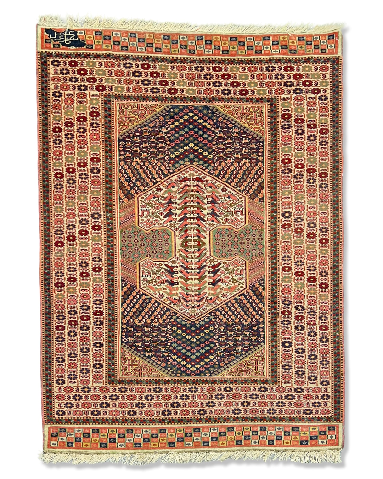 A HAND-KNOTTED SHIRVAN WOOL TRIBAL RUG WITH TREE OF LIFE MEDALLIONS: A woollen hand-knotted tribal rug featuring a dark navy blue field densely populated with geometric motifs. The central composition consists of a vertical column of nested, stepped medallions interspe