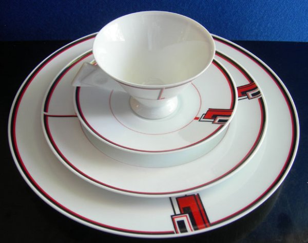 ART DECO LLOYD WRIGHT 54 PC MIKASA DINNERWEAR: CUBIST ART DECO 54 PC EXPRESSIONS CHINA DINNERWARE PRODUCED BY MIKASA OF JAPAN C. 1980s. INSPIRED BY THE DESIGNS OF FRANK LLOYD WRIGHT FOR THE IMPERIAL HOTEL TOKYO, JAPAN. BLACK & ORANGE ART DECO PATT
