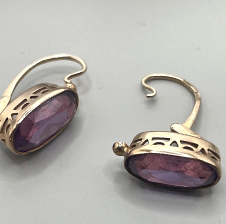 RARE MID CEN RUSSIAN 14KT G ALEXANDRITE EARRINGS: Each marked with a Russian star with hammer and sickle in middle, about 1" long, center stone looks and behaves like Russian Alexandrite., also marked 583, has the letters GHAO, excellent condition, t