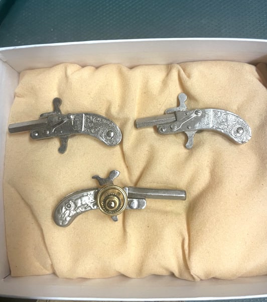 RARE FIRING PISTOL CUFFLINKS & TIE CLIP SET: Tie clip and matching Cuff Links- made in Austria, Vented Round Butt w/Deer & Rabbit Grips- Pinfire Guns by Berloque and purchased IN AUSTRIA in the 1950's - miniature 2mm Pinfire pistol from Austria 