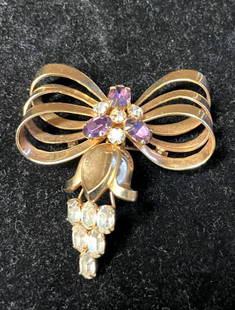 QUALITY ELSA SCHIAPARELLI RARE JEWELED BROOCH: About 2" long, faux diamond, and amethyst, signed , excellent condition