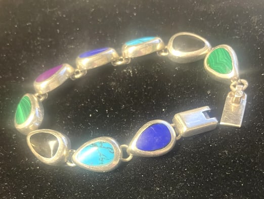 GREAT STERLING AND SEMI-PRECIOUS STONE BRACELET: 7" LONG, with malachite, turquoise, lapis, onyx, weighs just under 41 grams