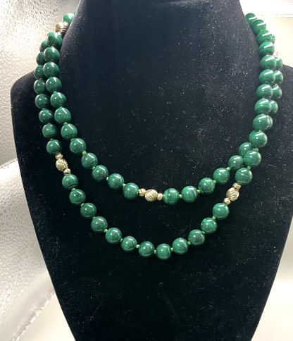 VTG 14KT Y.G MALACHITE OPERA LENGTH NECKLACE: 22" LONG, WITH 3MM CARVED MALACHITE BEADS, 7 LARGE 14KT YELLOW GOLD SPACERS,POSSIBLY 2 -3 DWT OF GOLD