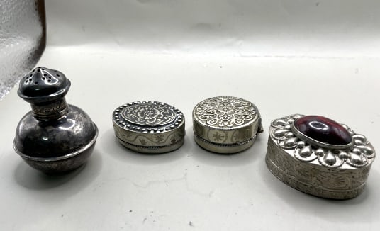 LOT OF 4 SMALL STERLING OBJECTS D'ART: TO include a vintage snuff bottle, and 3 pill boxes, one very very ornate garnet stone, largest 1 1/2" total weight of the 4 nice items 78 grams