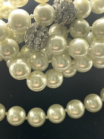 OPERA LENGTH CHINESE GRADUATED PEARLS WITH SILVER
