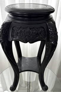 ANTIQUE CHINESE CARVED WOODEN SIDE TABLE: Stands 25" tall, and 13" , from a Miami Beach estate