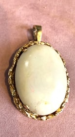 LARGE 14KT Y.GOLD PENDANT WITH LARGE WHITE OPAL