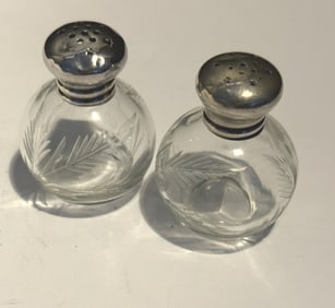 PAIR OF ANTIQUE SMALL STERLING LIDDED SHAKERS