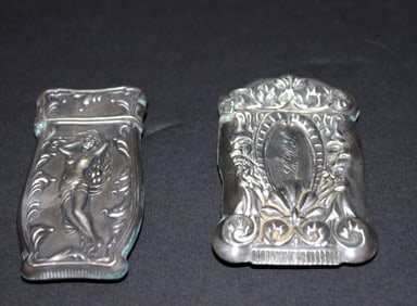 PAIR OF ART NOUVEAU STERLING MATCH SAFES