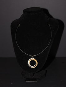 PHILLIPE ChARRIOL 18KT GOLD CROSSOVER NECKLACE