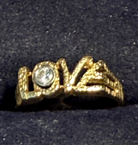 14KT YELLOW GOLD & DIAMOND "LOVE " RING: This ring has been sized down to a 6, which removed the 14kt mark, but has been tested at 14kt, diamond about .08 ct. total weight 1.74 dwt