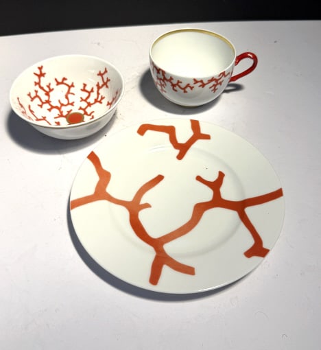 COLLECTION 3 PIECES RAYNAUD CRISTOBAL DINNERWARE: Designed by Alberto Pino, coral dinnerware for Limoges. to include salad plate, tea cup and soup bowl, all in never used condition
