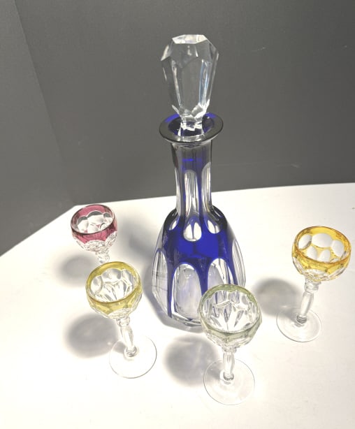 VINTAGE BOHEMIAN DECANTER SET WITH 4: Cobalt cut to clear, with 4 matching cordials, glasses excellent, small chip to rim of decanter