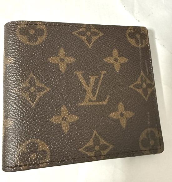 LOUIS VUITTON MONOGRAMED LEATHER WALLET (1 of 3)