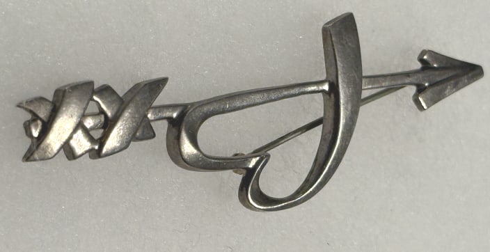 A TIFFANY & CO PALOMA PICASSO SILVER XO PIN: An authentic vintage 1983 Tiffany & Co Paloma Picasso sterling silver pin XO Love & Kisses. Hallmarks: 1983 Tiffany & Co. / Sterling / Paloma Picasso
