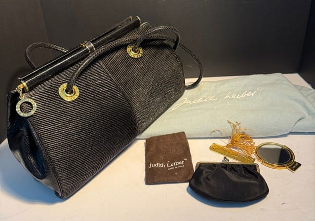 VINTAGE JUDITH LEIBER LARGE KARANG SNAKE SKIN SHOULDER BAG: About 10" wide, and 7 1/2" tall, with long leather strap, shiny snake skin, comes with original mirror, comb and purse, in like almost never used condition, property of a Miami Beach lady