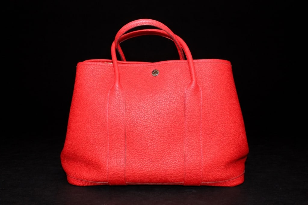 HERMES GARDEN PARTY 36 TOTE IN ROUGE COLOR COA: crafted from textured leather with rolled handles and snap closure, in good used vintage condition, was property of the French Baroness, comes with coa from Legit Grails