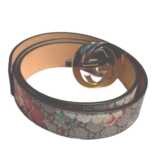 GUCCI BLOOMS MOON CALFSKIN DRY ROSE BELT: Size 28, this stylish belt, is crafted of Gucci monogram, with pink floral print, and is in very good condition