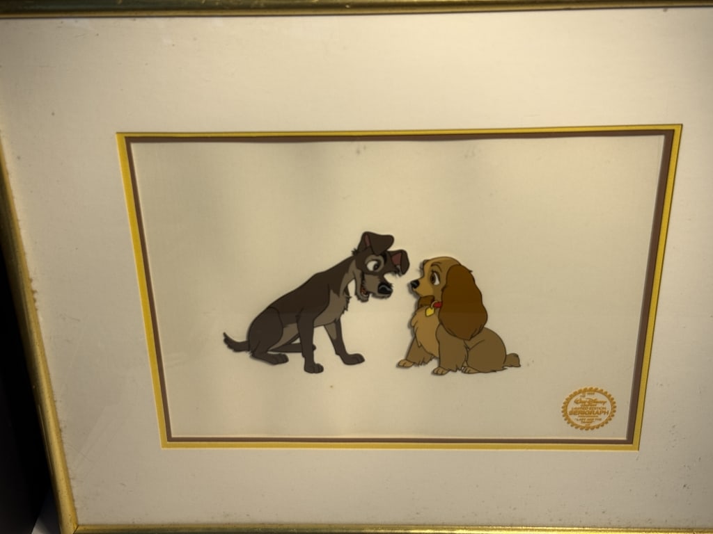 DISNEY LMT ED. CEL " LADY AND THE TRAMP": From the 1955 film, seal to bottom, limited edition framed measures 17 14" x 21 1/4, WITH COA TO BACK